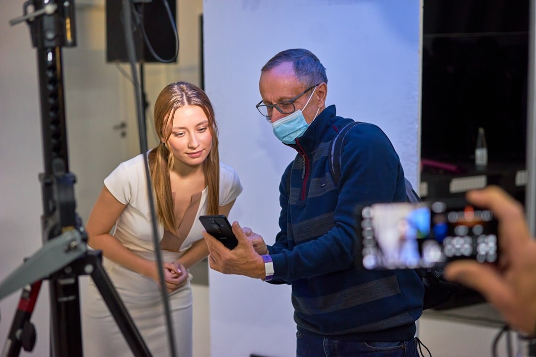 Instructor teaching students about live broadcast production